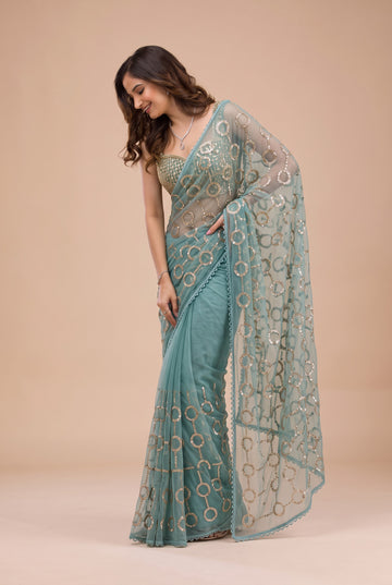 Sea Green Net Saree with Golden Circular Pattern Beads and Stone Work