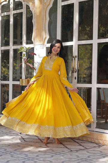 Yellow Color Faux Blooming Rich Embroidered Work Gown