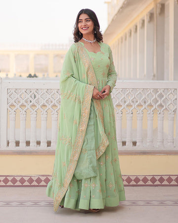 Faux Georgette Pista Ethnic Gown With Sequins Embroidered Dupatta