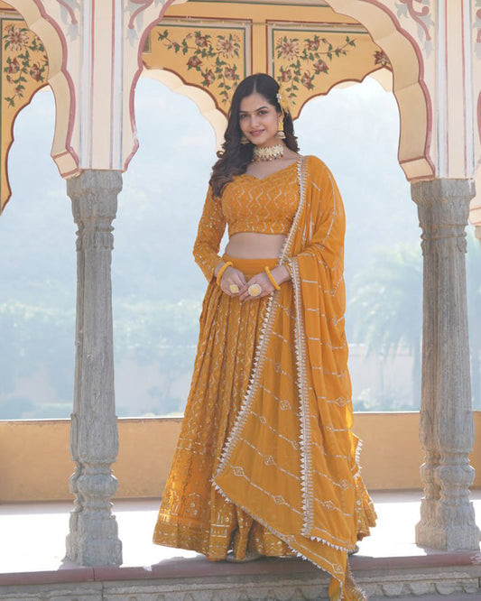 Georgette Heavy Embroidery Threaded Semi Stitched Yellow Lehenga Choli