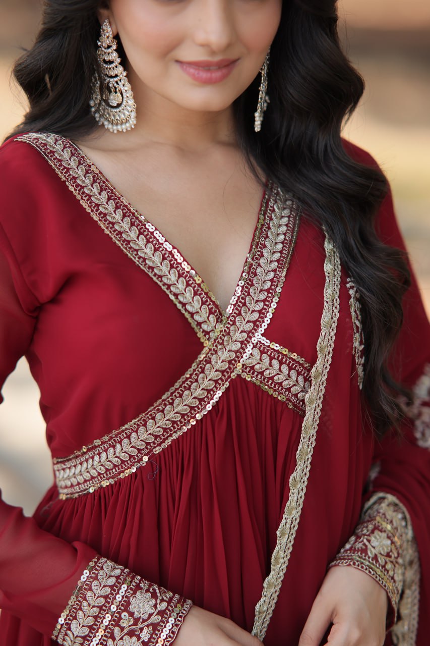 Model wearing a Wedding Wear Embroidered Maroon Alia Cut Gown with Dupatta, perfect for weddings and festive occasions