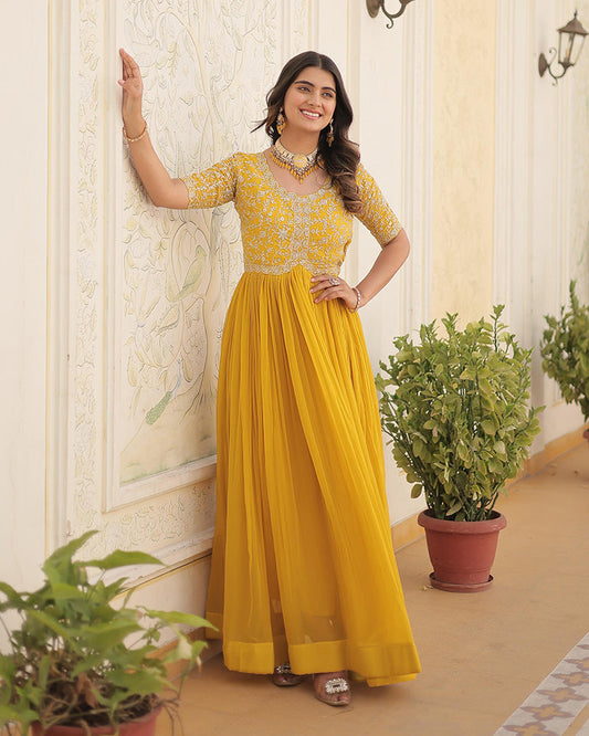 Yellow Color Faux Blooming Zari Sequence Embroidered Ethnic Gown