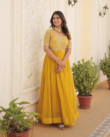 Yellow Color Faux Blooming Zari Sequence Embroidered Ethnic Gown